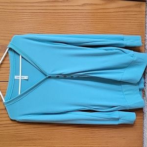 Long button up sweater.